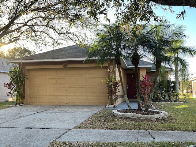 ranch-style home with a garage