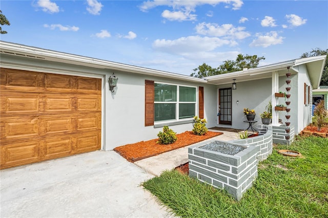 entrance to property featuring a garage