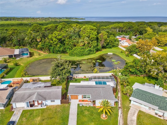 bird's eye view with a water view