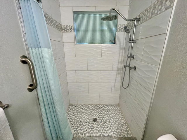 bathroom with curtained shower