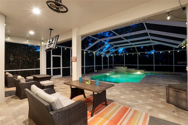 view of pool with an outdoor living space, glass enclosure, and a patio area