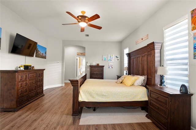 bedroom featuring ceiling fan and light hardwood / wood-style flooring