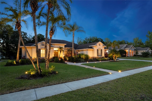 view of front facade featuring a front yard