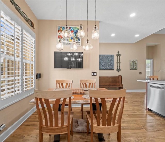 dining room with light hardwood / wood-style floors