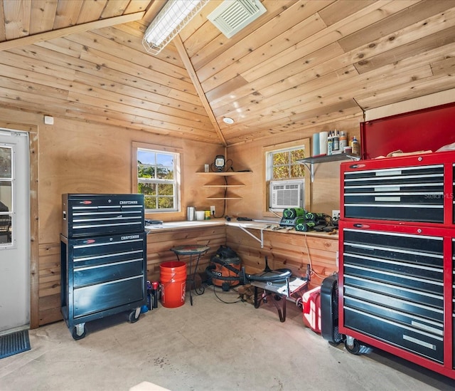 miscellaneous room featuring a workshop area, wood walls, wooden ceiling, and vaulted ceiling