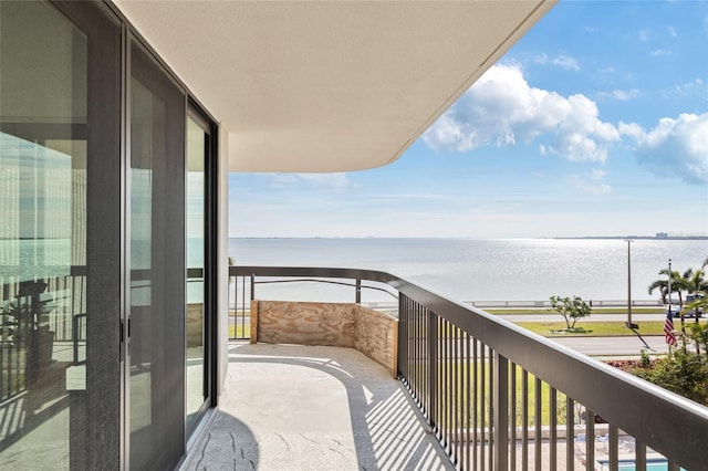 balcony featuring a water view