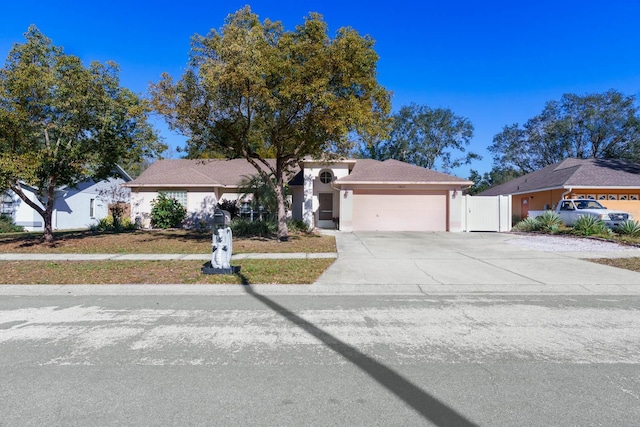 single story home with a garage