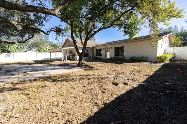 view of front of property featuring a patio area