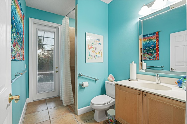 full bathroom with tile patterned flooring, toilet, vanity, and baseboards