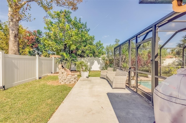 view of patio / terrace featuring a lanai and a fenced in pool