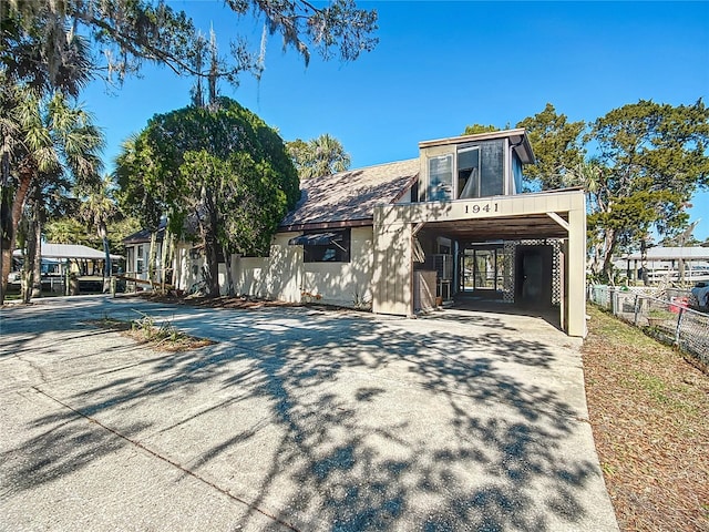 view of front of home featuring a carport