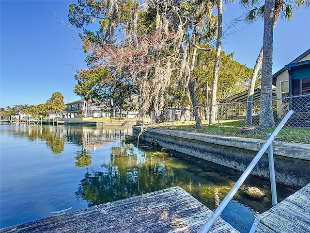 view of dock with a water view