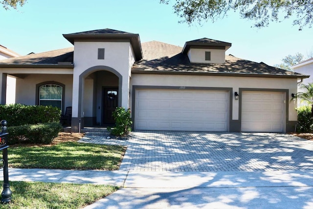 view of front of property featuring a garage