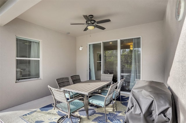 view of patio with ceiling fan and grilling area