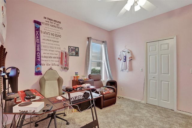 office area with light carpet and ceiling fan