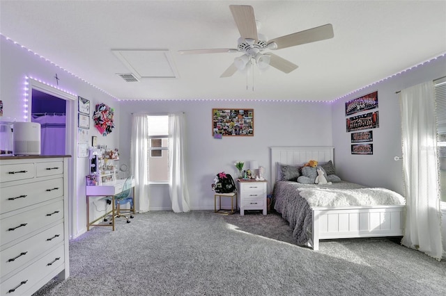 bedroom with ceiling fan and carpet