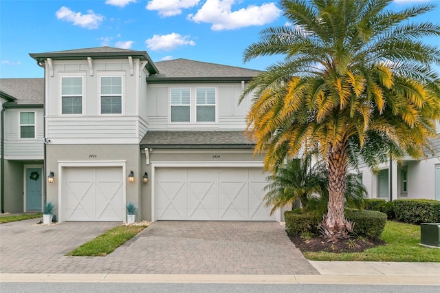 view of front of property with a garage