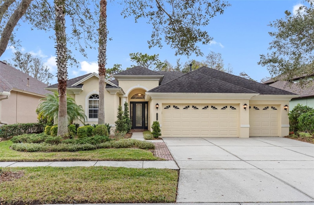 view of front of property with a garage