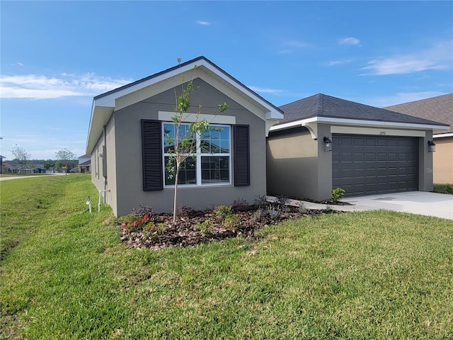 ranch-style house with stucco siding, driveway, a garage, and a front lawn