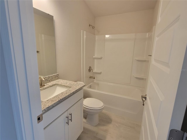 full bathroom with  shower combination, toilet, and vanity