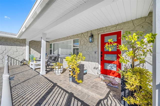 entrance to property with covered porch