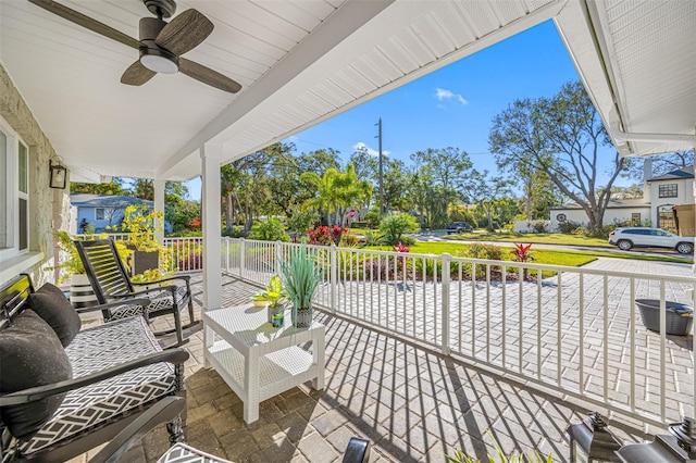 view of patio with covered porch and ceiling fan