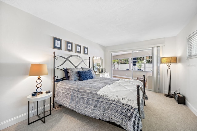 bedroom with light carpet