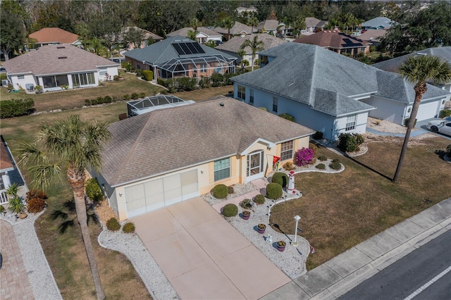 birds eye view of property with a residential view