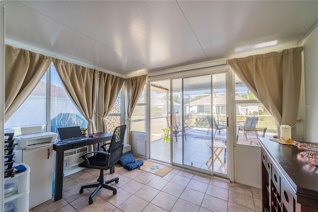 office with a sunroom and light tile patterned flooring