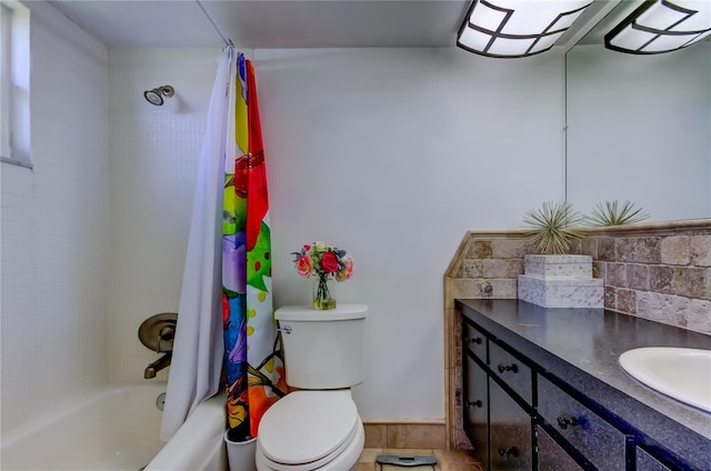 full bathroom with vanity, toilet, and shower / tub combo with curtain