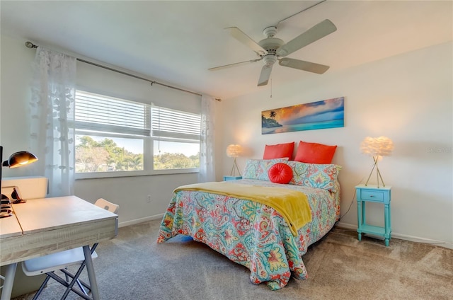 bedroom featuring ceiling fan and light colored carpet