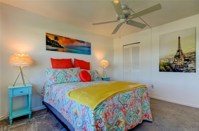 carpeted bedroom with ceiling fan and a closet