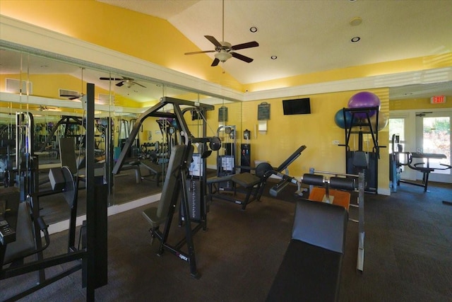 exercise room with ceiling fan and vaulted ceiling