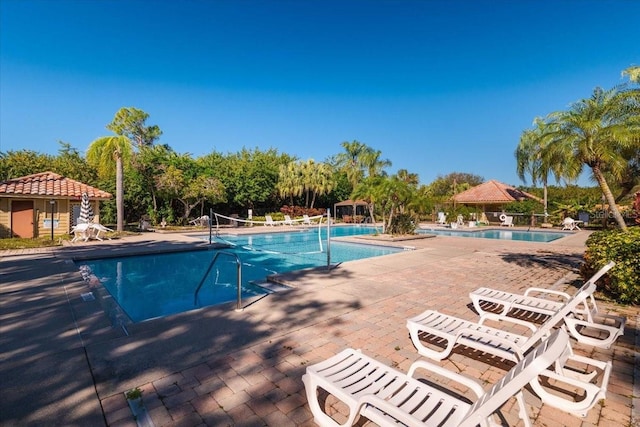 view of swimming pool featuring a gazebo