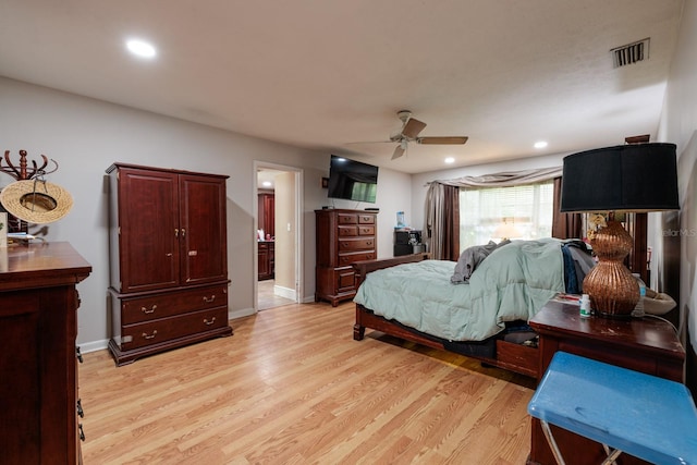 bedroom featuring light hardwood / wood-style flooring and ceiling fan