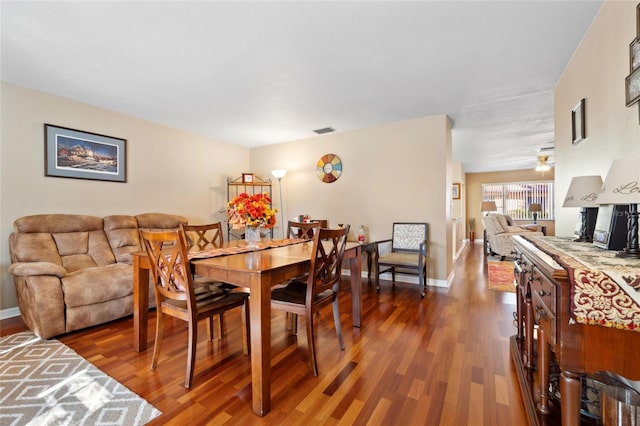 dining area featuring hardwood / wood-style floors