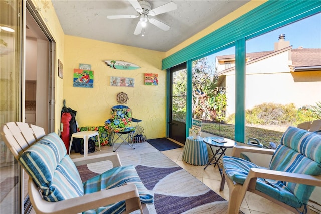 sunroom / solarium with ceiling fan