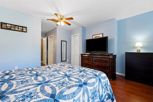 bedroom with ceiling fan and dark wood-type flooring