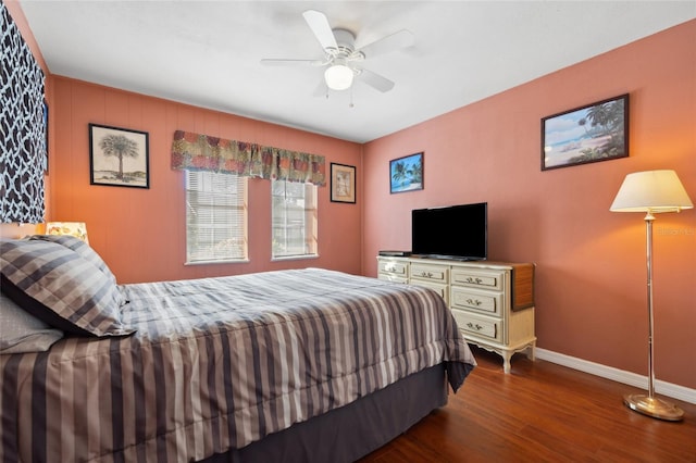 bedroom featuring ceiling fan and dark hardwood / wood-style floors