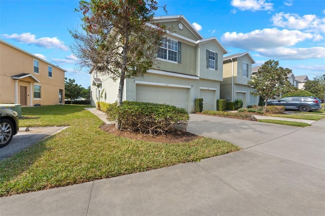 view of front of home with a garage and a front yard