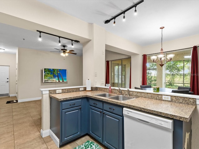 kitchen featuring blue cabinetry, kitchen peninsula, white dishwasher, decorative light fixtures, and ceiling fan with notable chandelier