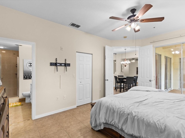 bedroom with ensuite bathroom, a closet, ceiling fan, and light tile patterned flooring