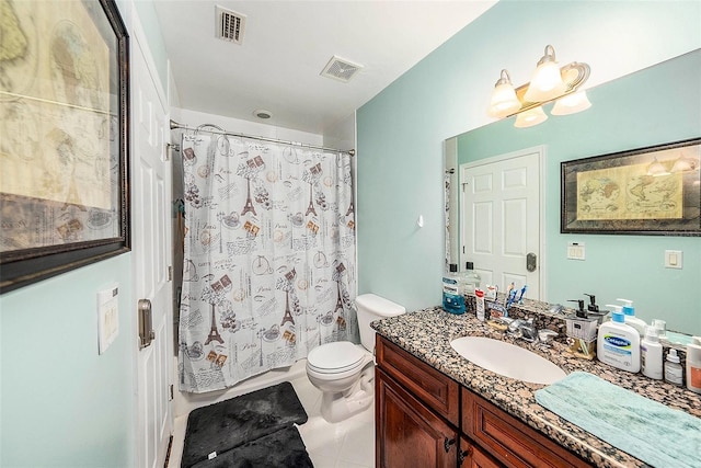 bathroom with tile patterned floors, toilet, vanity, and a notable chandelier