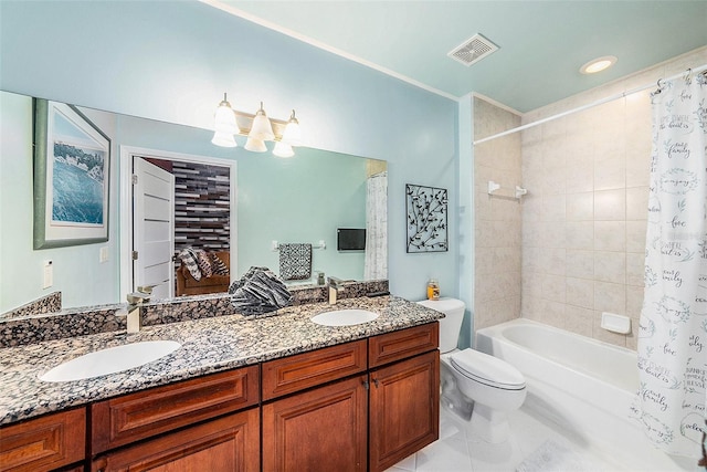 full bathroom with toilet, vanity, tile patterned flooring, and shower / tub combo with curtain