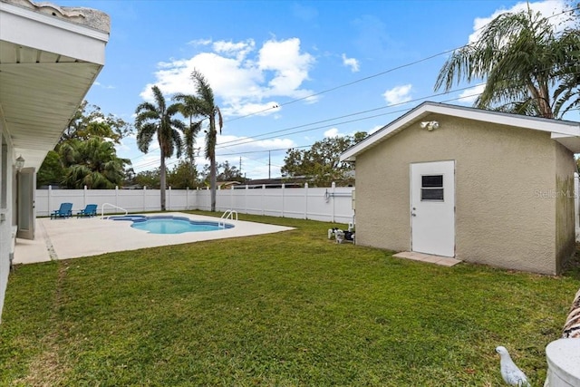 view of yard with a fenced in pool and a patio