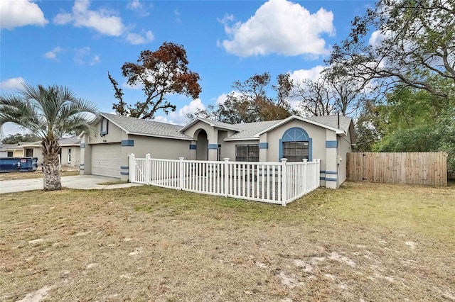 single story home with a front lawn and a garage