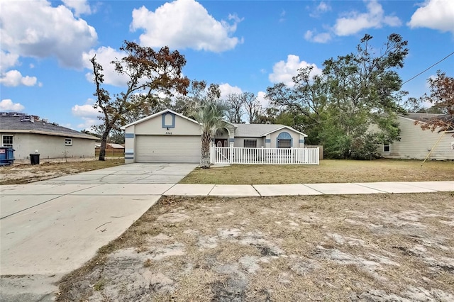 single story home featuring a garage