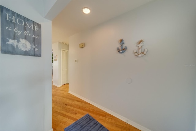 hall featuring wood-type flooring