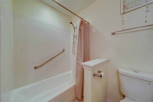 bathroom with toilet and shower / bathtub combination with curtain