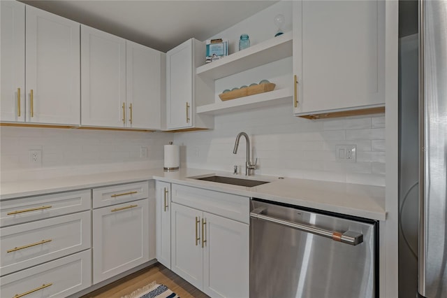 kitchen with stainless steel appliances and white cabinets